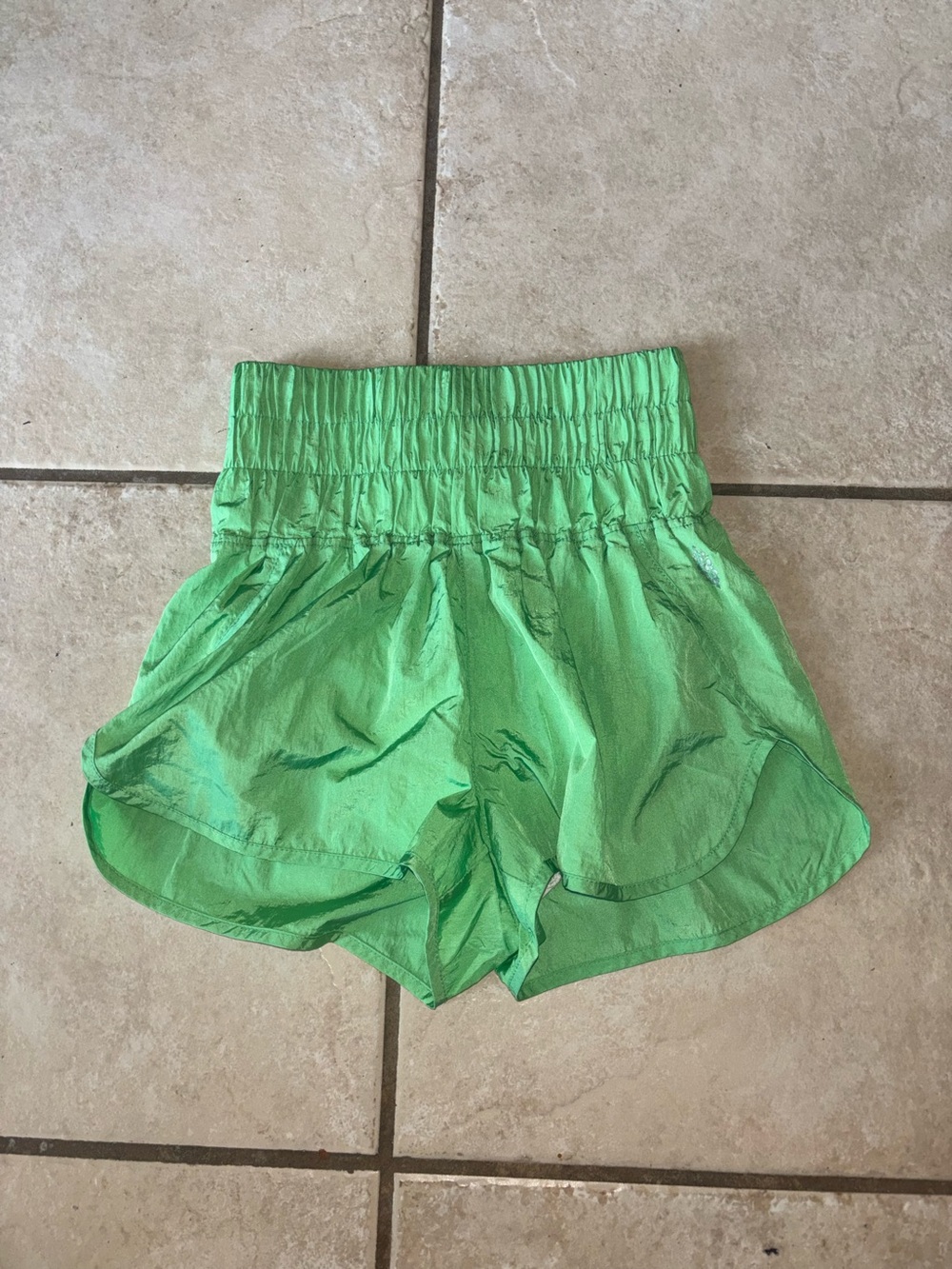 FP Movement by Free People shorts feature a wide, smocked waistband